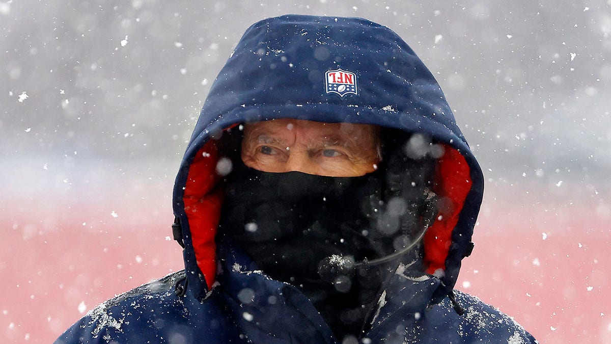 Bill Belichick looks on