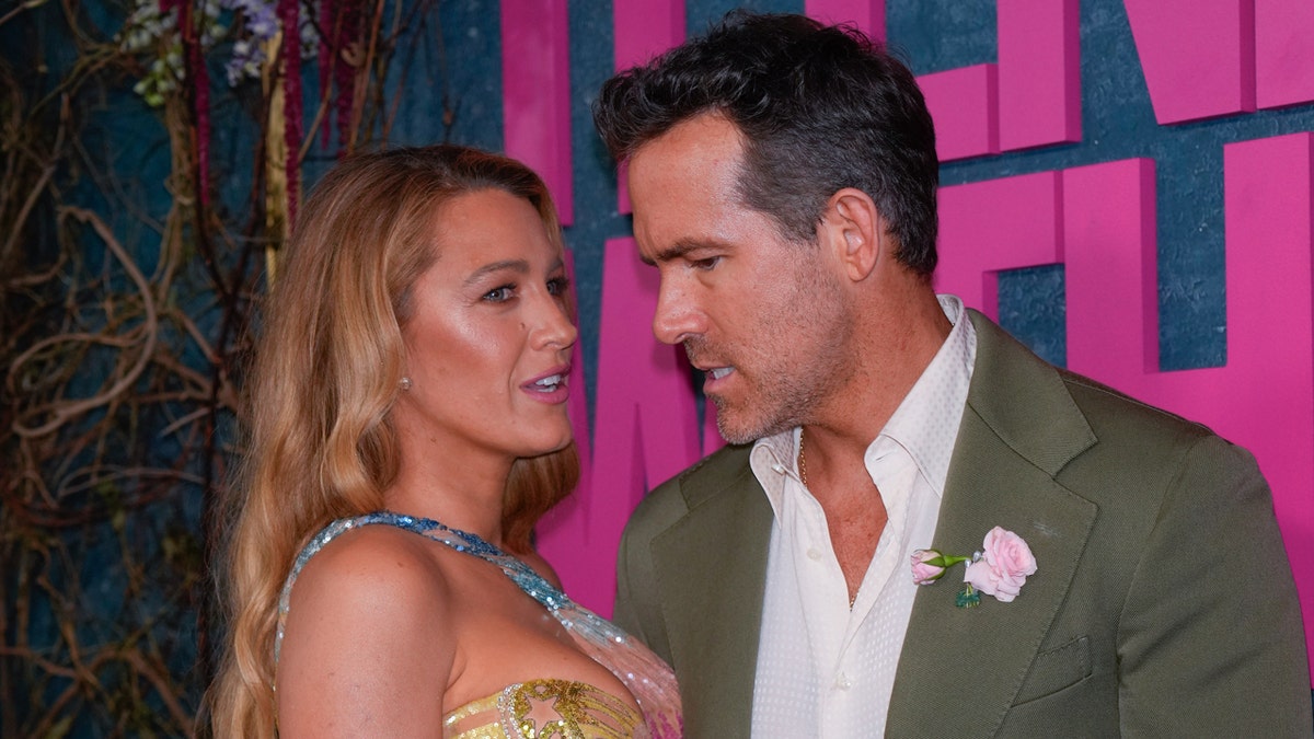 Blake Lively and Ryan Reynolds talk on the red carpet