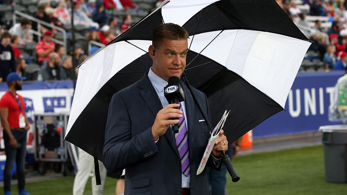 Brock Huard on the sidelines