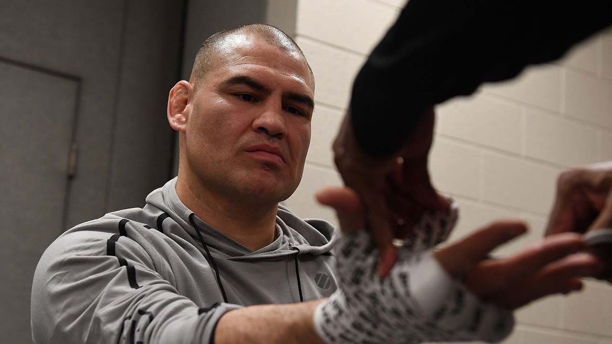 Cain Velasquez has his hands bandaged