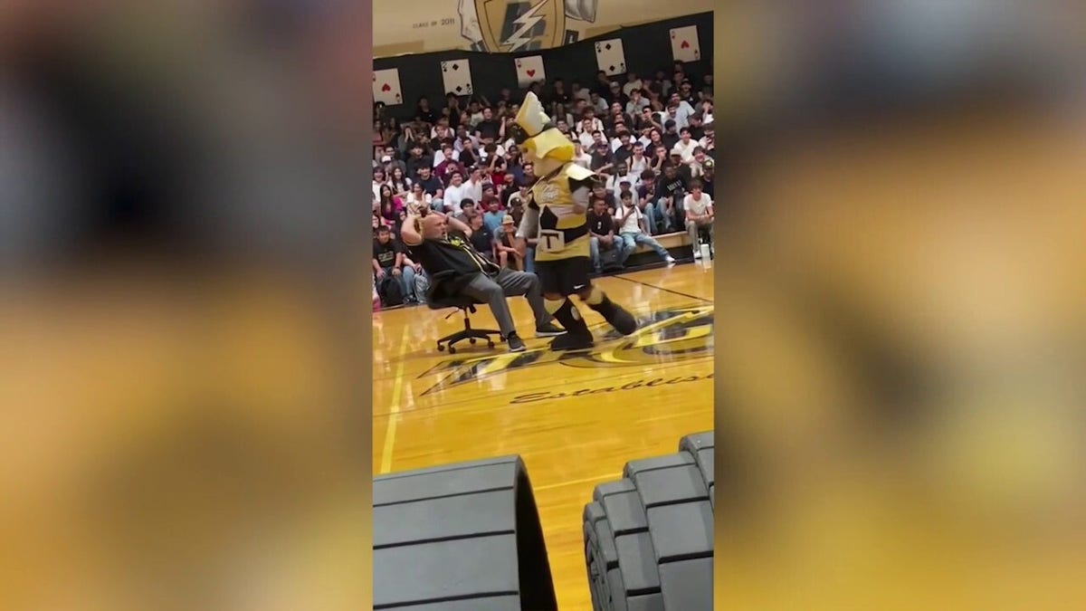 High school principal on leave following viral video with mascot 