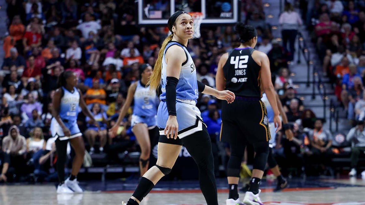 Chennedy Carter looks on during a game