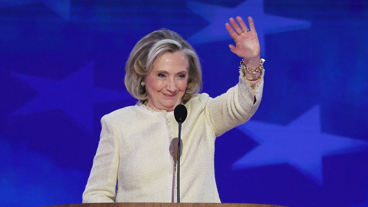 Hillary Clinton waves during Day one of the Democratic National Convention