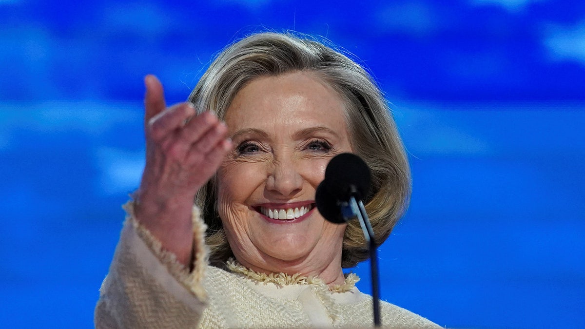 Hillary Clinton gestures as she speaks at the Democratic National Convention