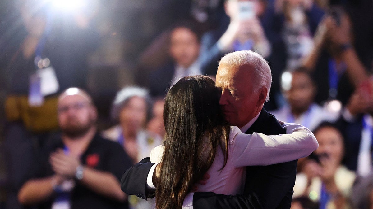Joe Biden embraces Ashley Biden during Day one of the Democratic National Convention