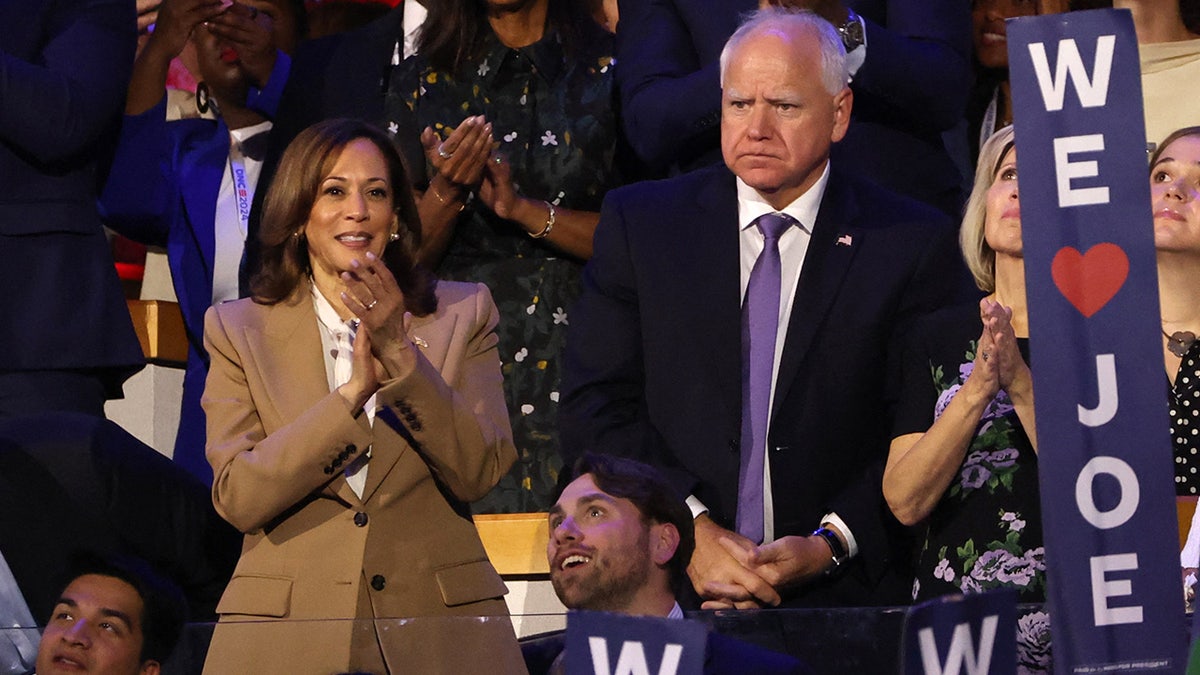 VP Kamala Harris, left, with Gov. Tim Walz, right