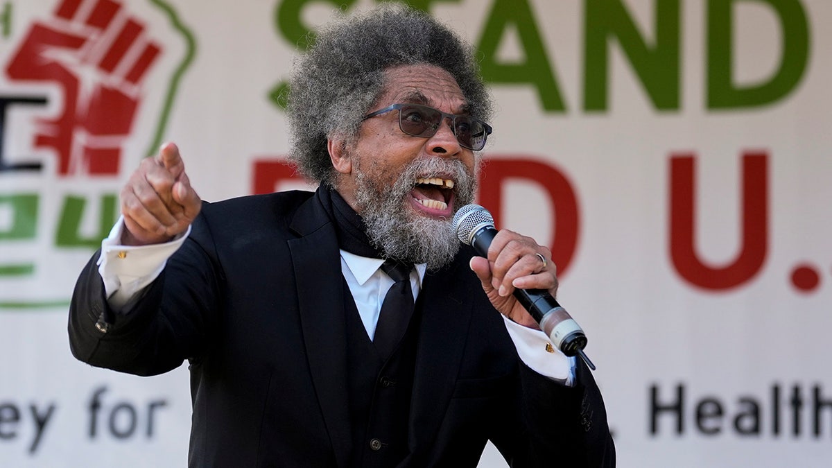 Progressive activist Cornel West speaks during a demonstration prior to a march to the Democratic National Convention