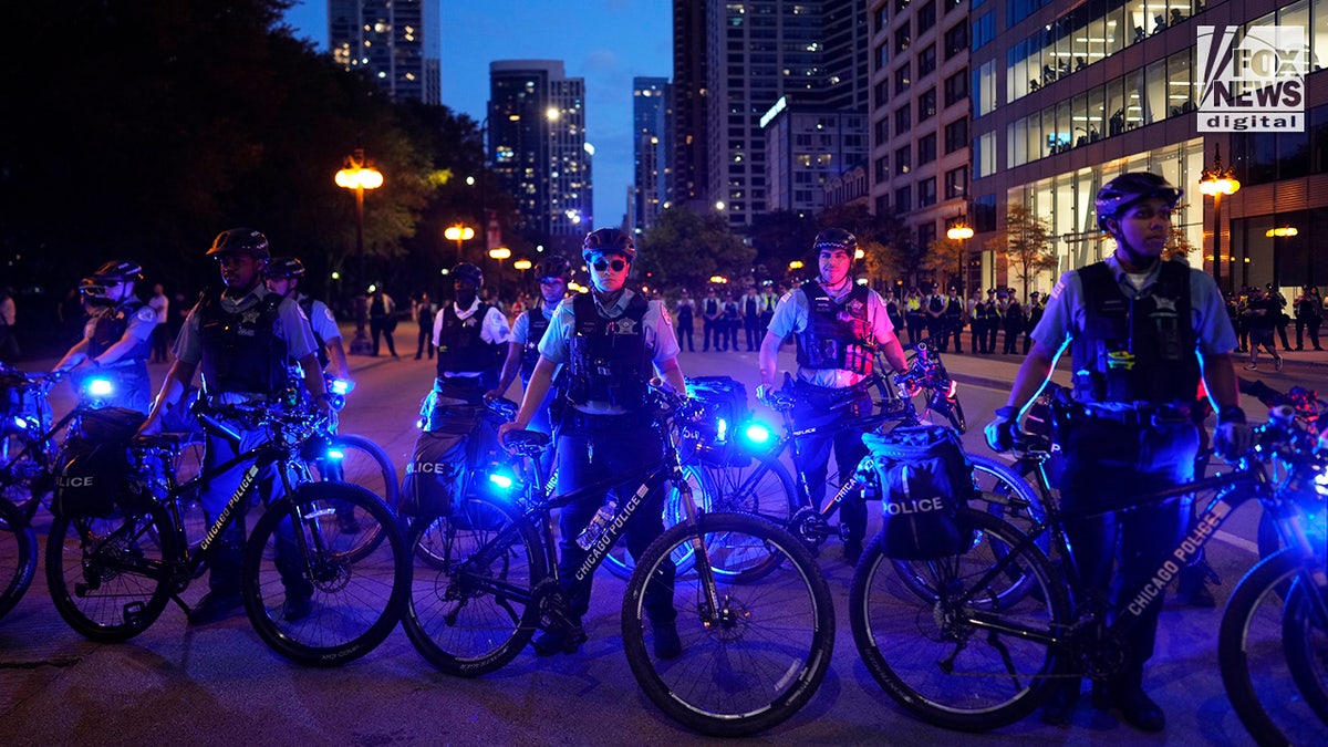 Police patrol the streets as anti-Israel protesters participate in the ‘Bodies Outside of Unjust Laws’ march ahead of the start of the Democratic National Convention