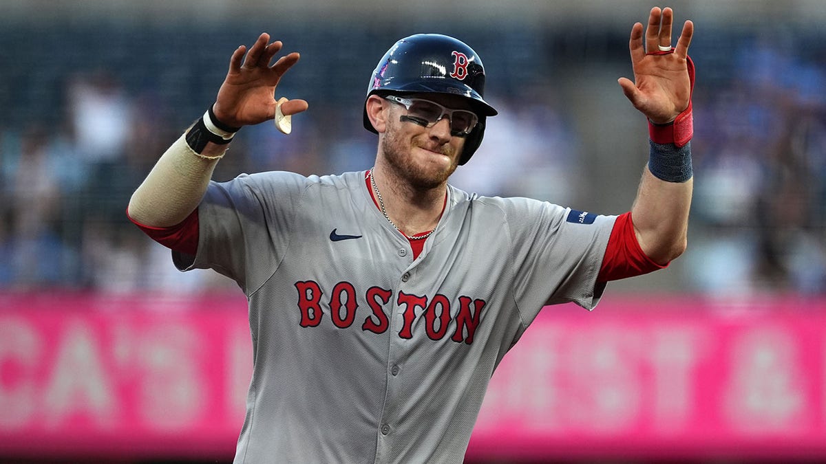 Danny Jansen celebrates