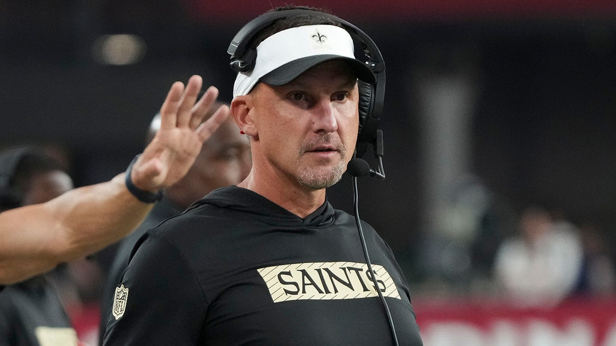 Dennis Allen watches