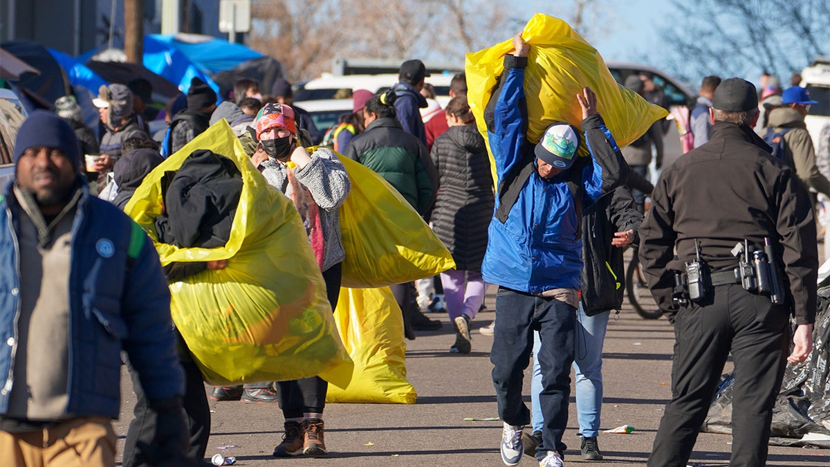 Migrants in Denver tent camp