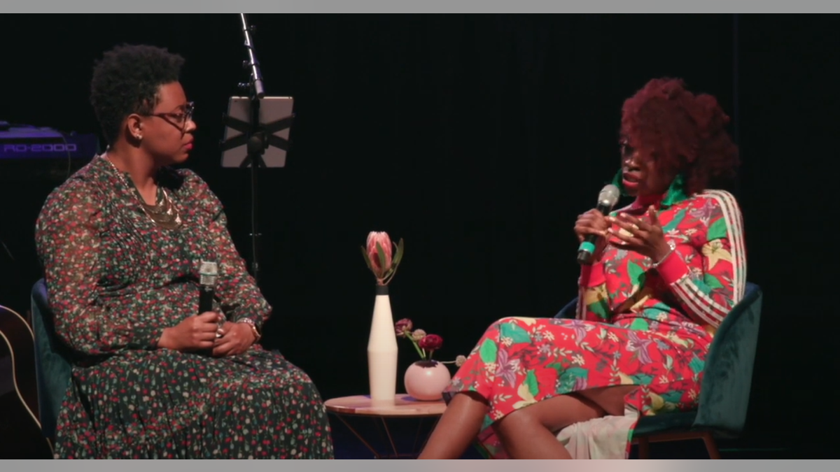 An activist speaks on stage