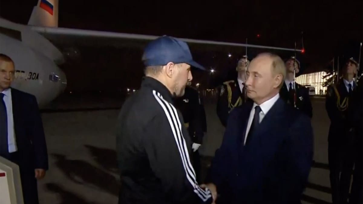Vladimir Putin greets FSB assassin Vadim Krasikov, as part of a major prisoner swap with the U.S. and other Western countries.