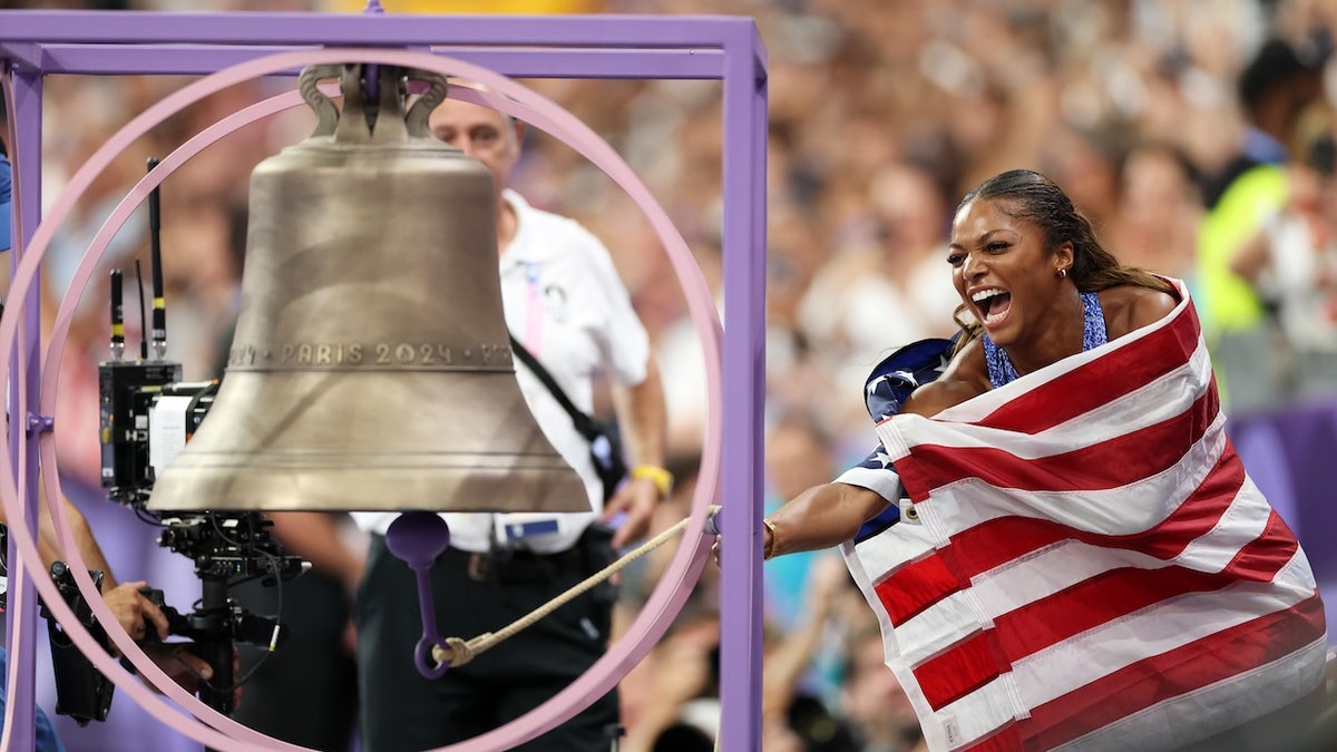 Gold medalist Gabrielle Thomas of Team USA celebrates.