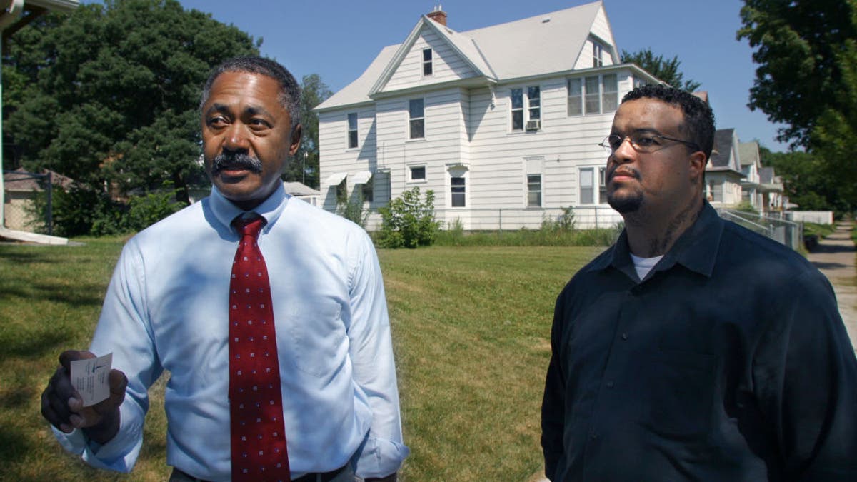 Don Samuels, right, with a community leader