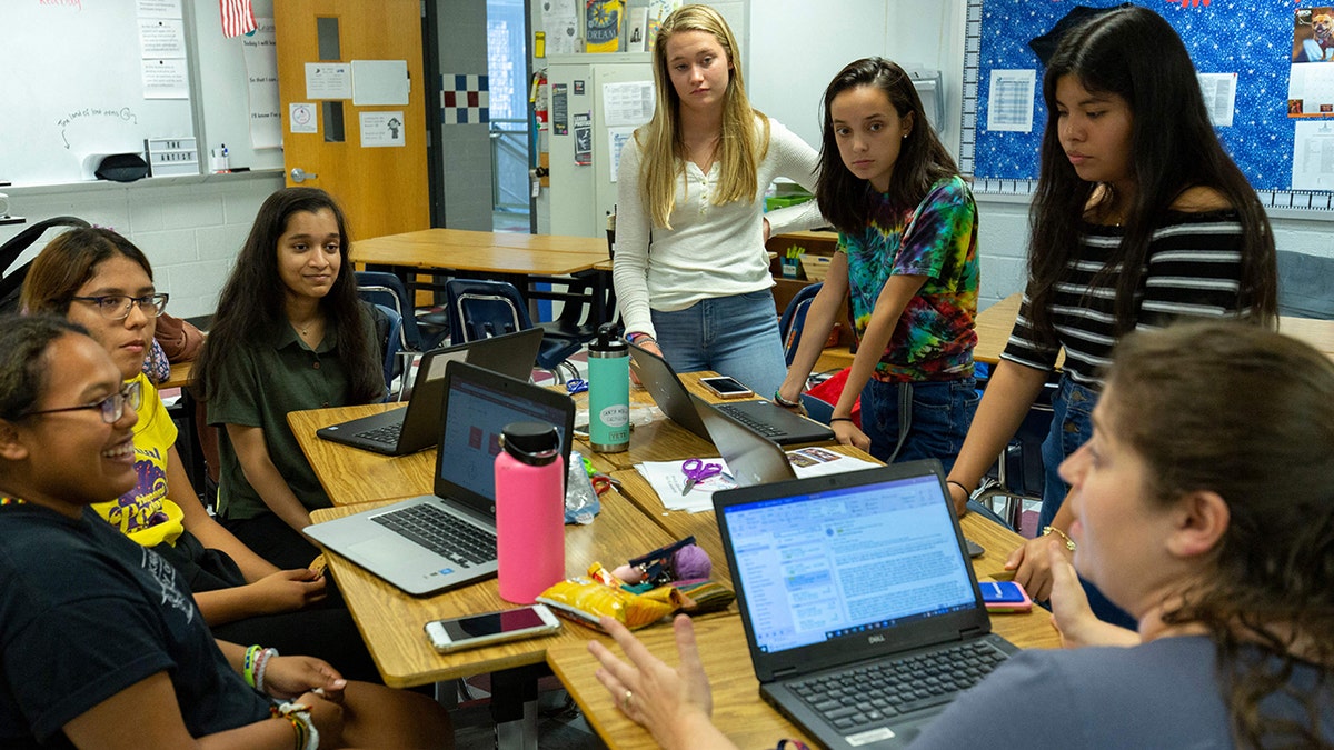 Teachers and students at Justice High School in Falls Church, VA