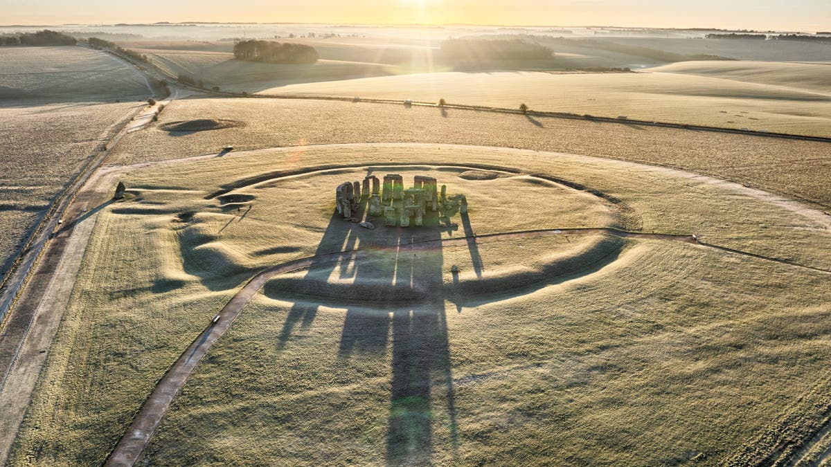 SALISBURY, ENGLAND - JANUARY 16: A view of Stonehenge at dawn with a morning frost on January 16, 2024 near Salisbury, England.
