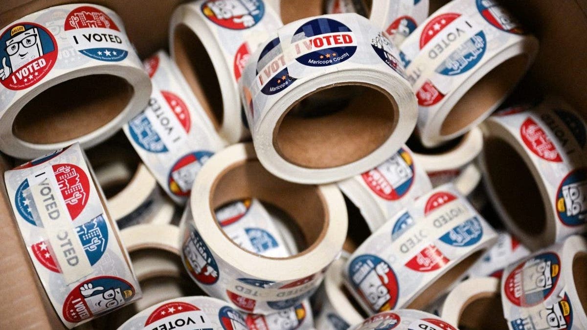 rolls of I voted stickers on display