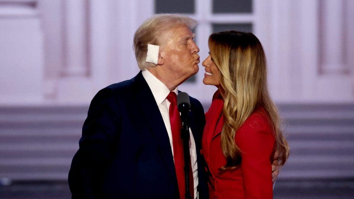 Former U.S. President Donald Trump (left) and former First Lady Melania Trump during the Republican National Convention (RNC) at the Fiserv Forum in Milwaukee, Wisconsin, U.S., on Thursday, July 18, 2024. Donald Trump, who accepted his party's presidential nomination, delivered his first public address since surviving a failed assassination attempt and detailed an incident he "too painful to tell." Photographer: Hannah Beier/Bloomberg via Getty Images