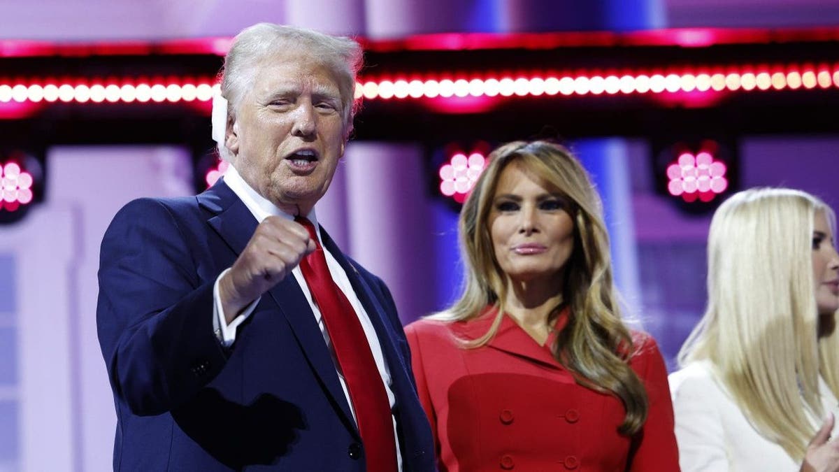 Republican presidential candidate, former US President Donald Trump and former First Lady Melania Trump on stage