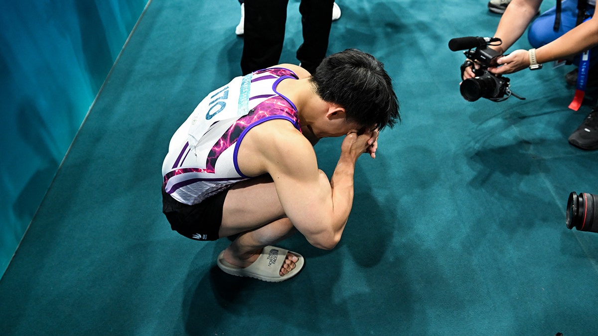 Carlos Edriel Yulo of the Philippines reacts after winning the men's floor exercise final in artistic gymnastics.