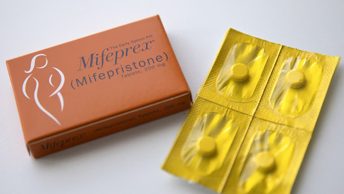 Pictured are the mifepristone box and pill packaging