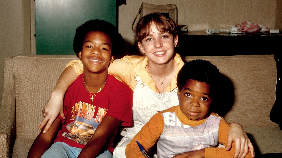 The child stars of Diffrent Strokes hugging.