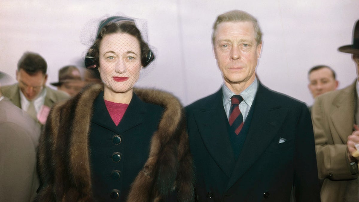 The Duke and Duchess of Windsor in formal wear looking directly at the camera.