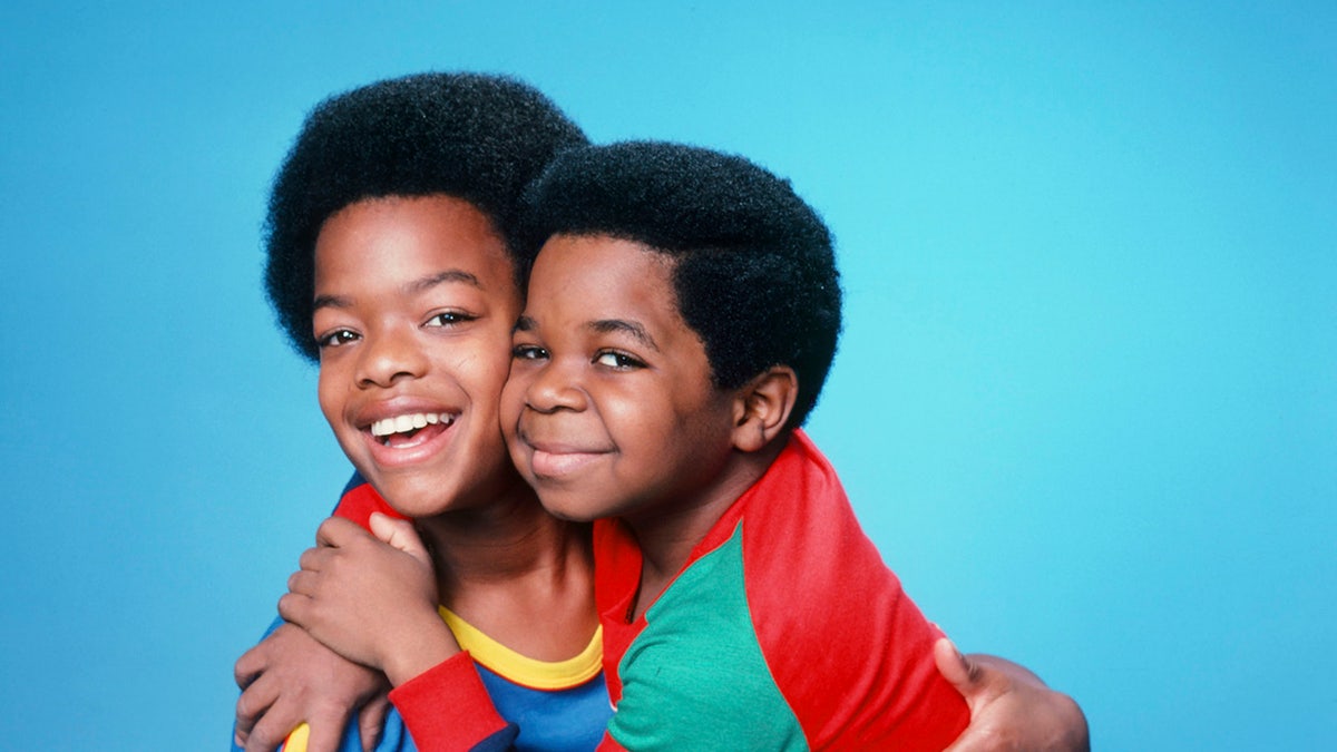 Gary Coleman embracing Todd Bridges