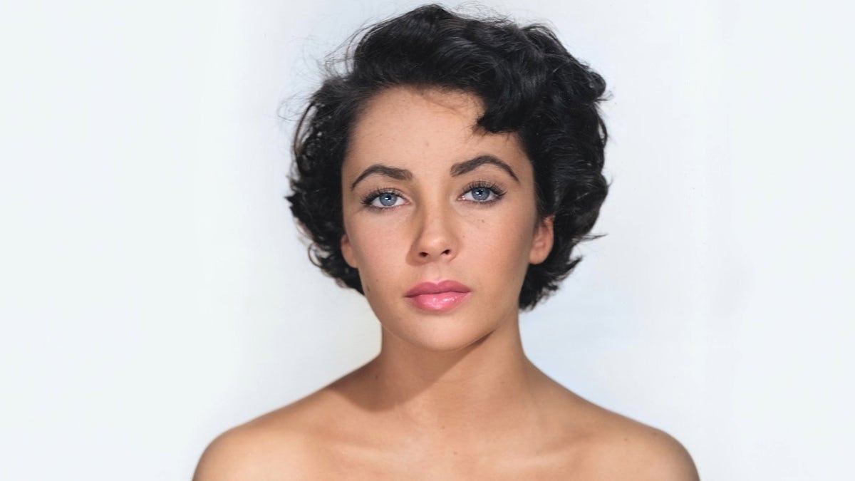 A close-up of Elizabeth Taylor against a white background.