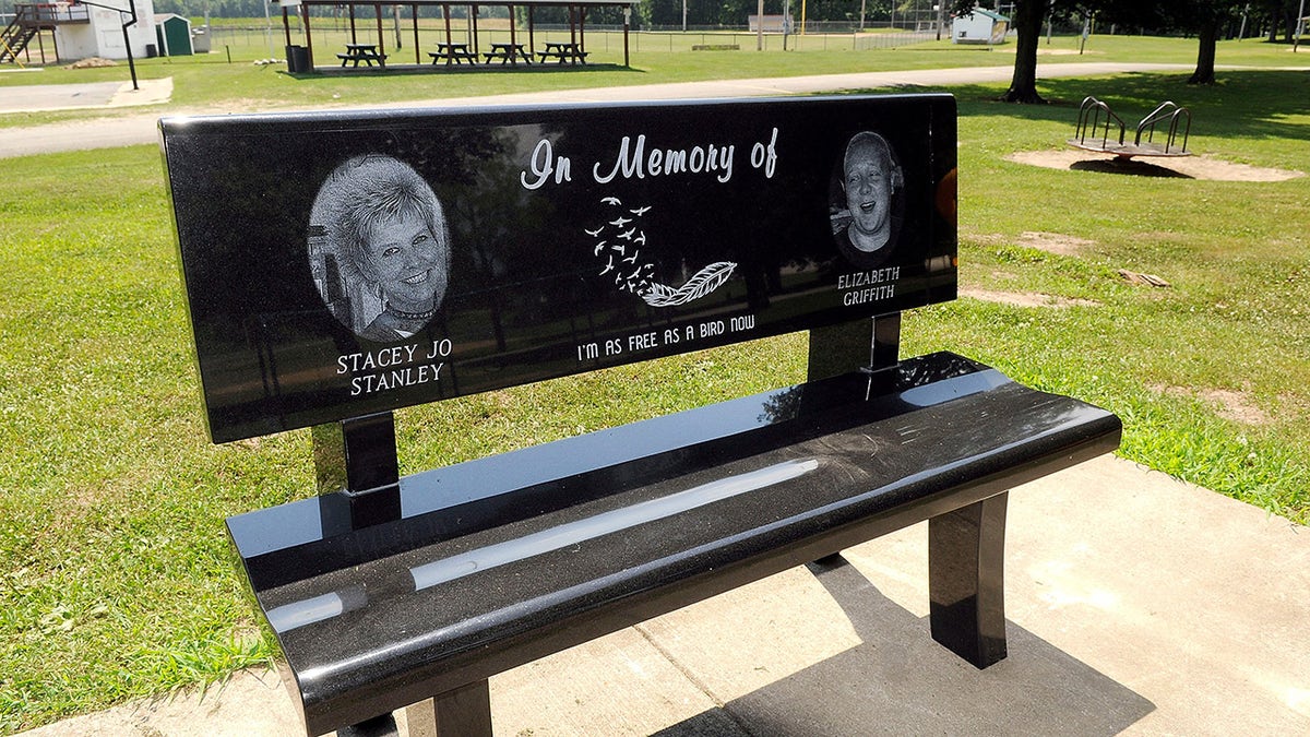 A black bench honoring two of Shawn Grates victims.