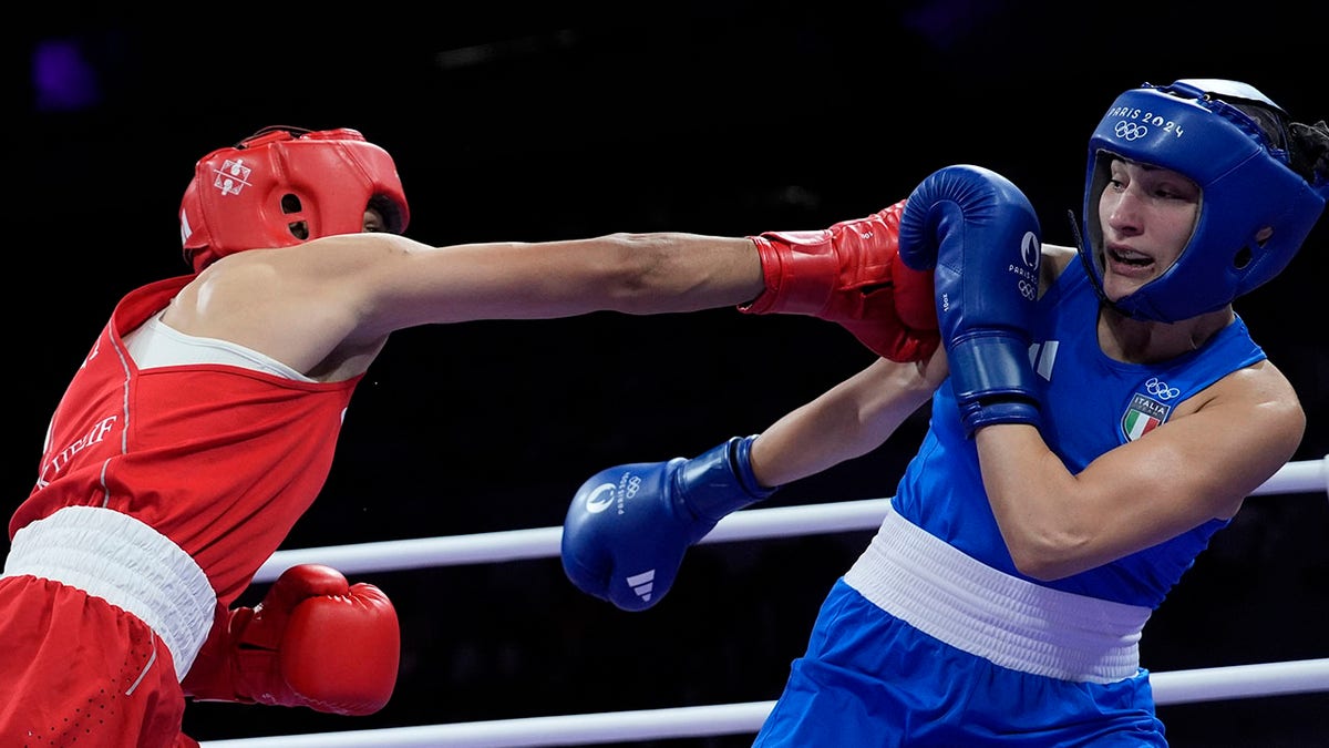 Imane Khelif punching female boxer