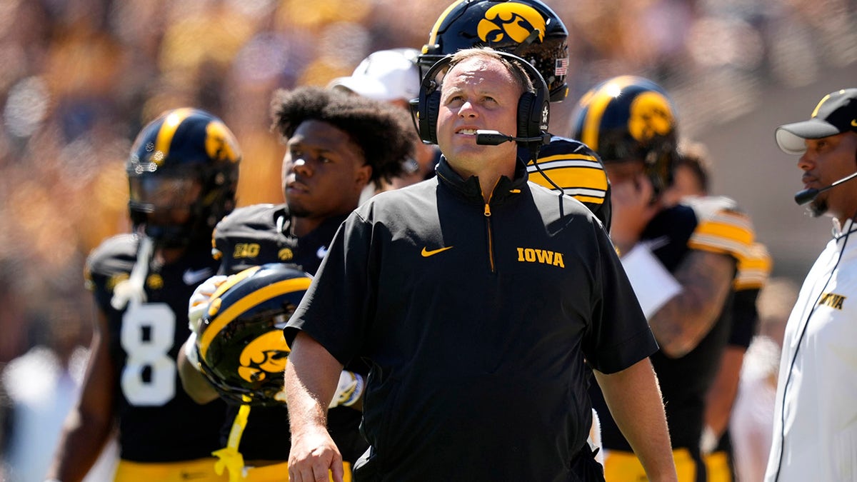 Iowa assistant coach on the sidelines