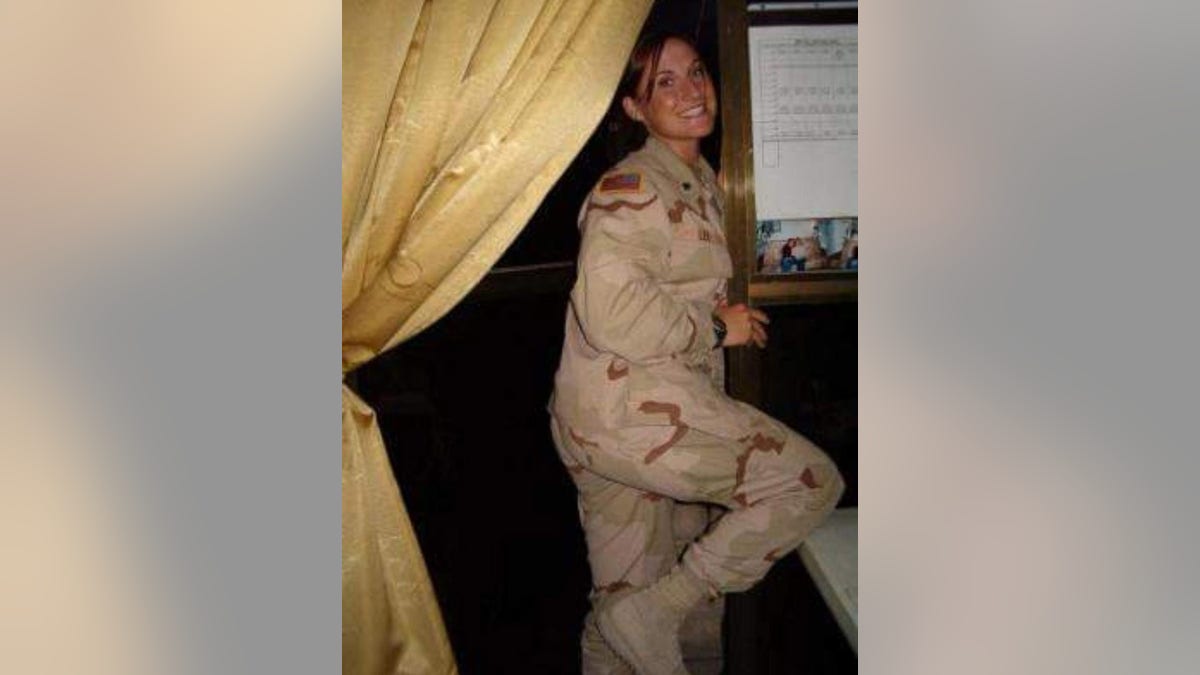 Jennifer Horn in military gear smiling