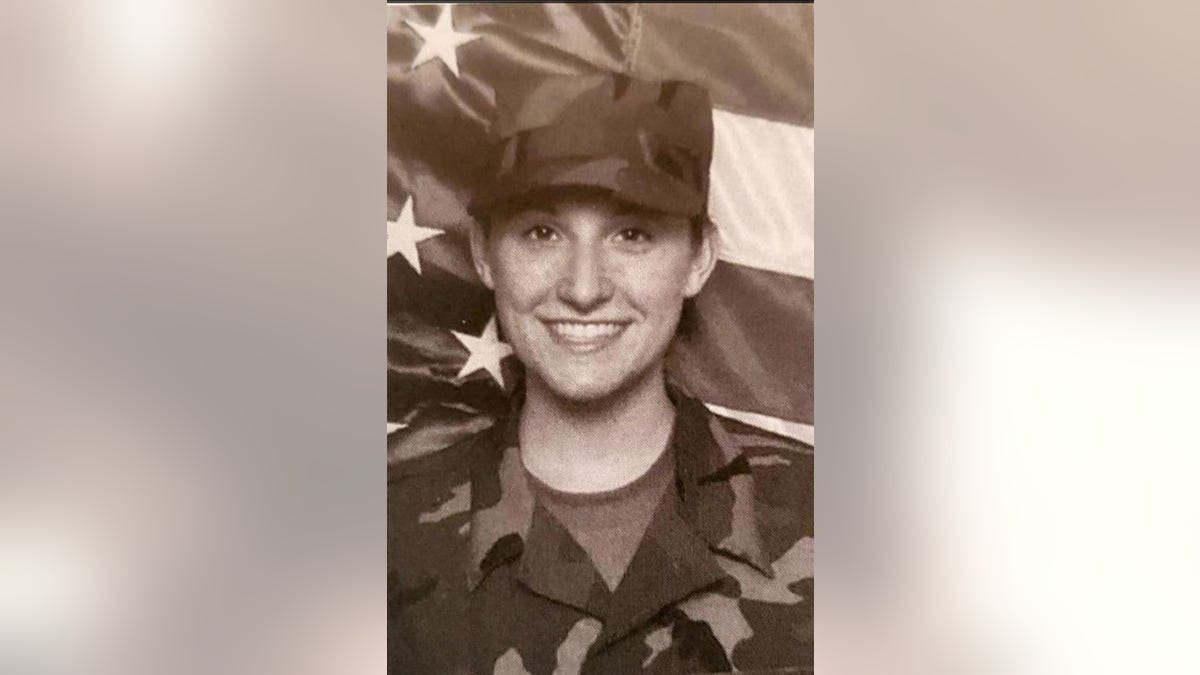 A close-up of Jennifer Horn smiling after she joined the military.