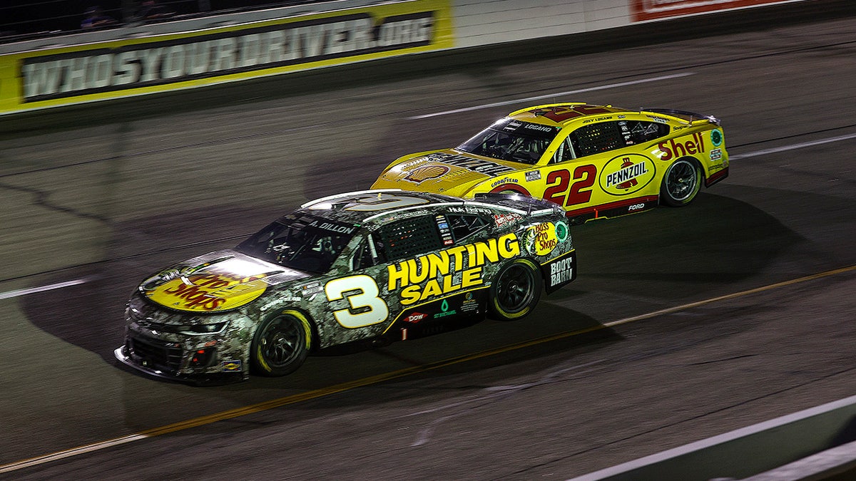 Austin Dillon battles Joey Logano