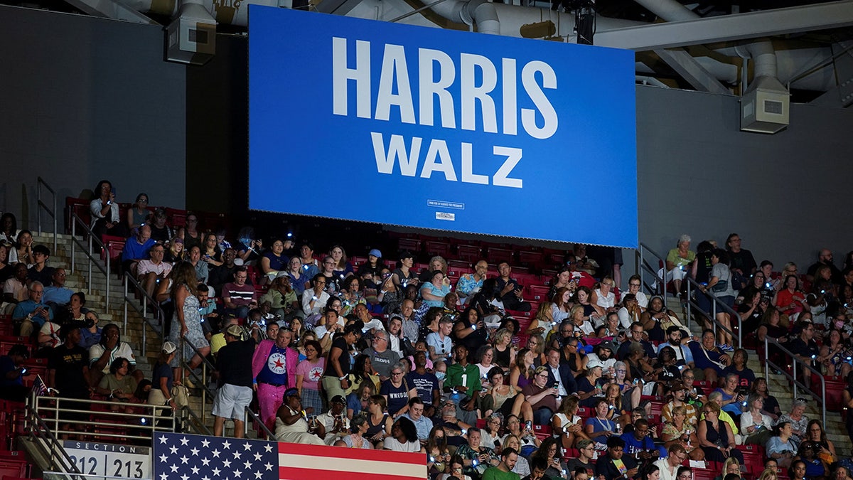 People take their seats ahead of U.S Vice President and Democratic presidential candidate Kamala Harris' rally