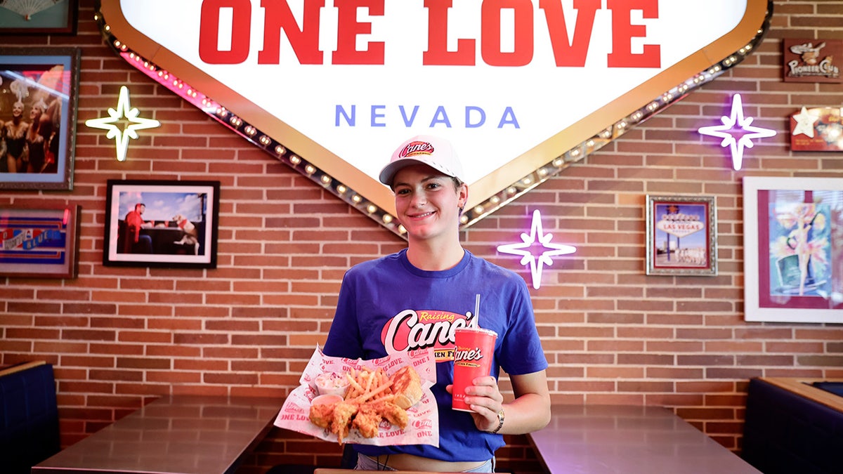 Katie Grimes holds Raising Cane's food