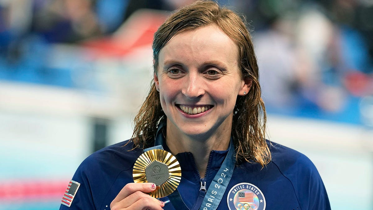 Katie Ledecky with gold medal