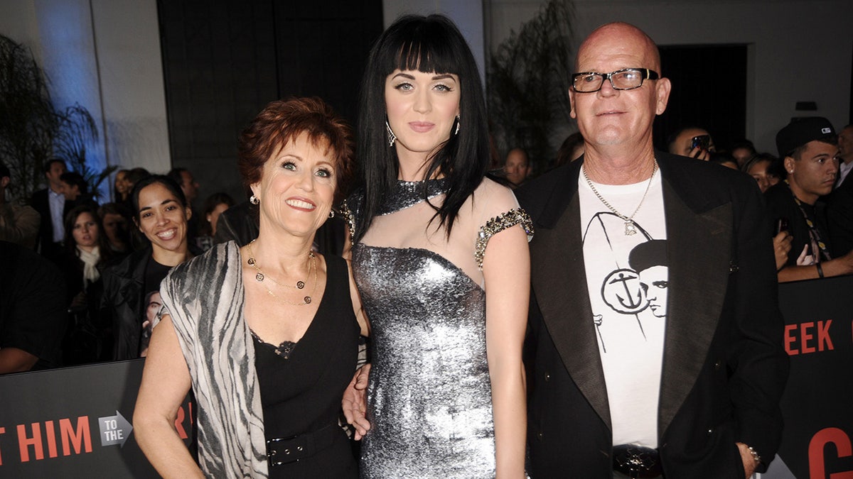 Katy Perry posing with her parents