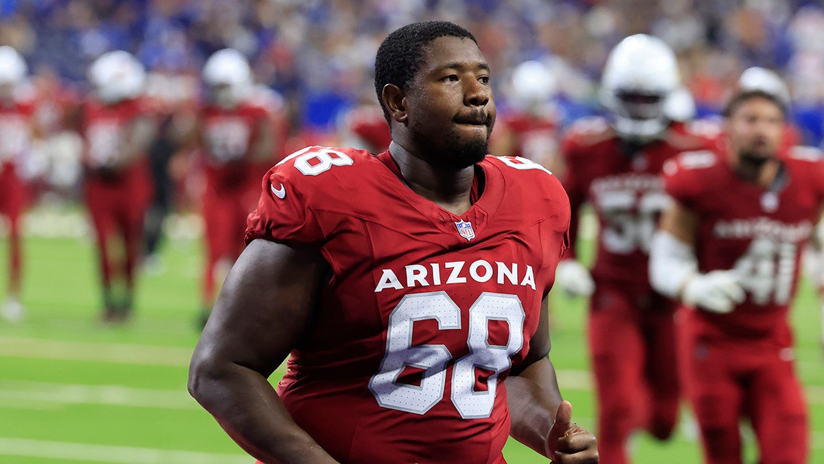 Kelvin Beachum runs on field