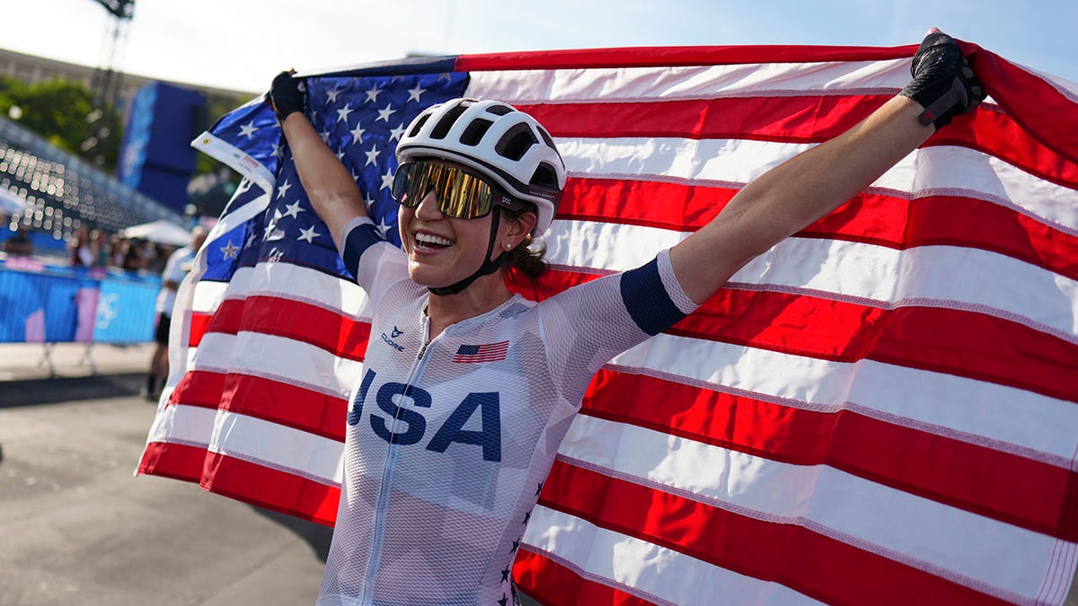 Kristen Faulkner with the American flag