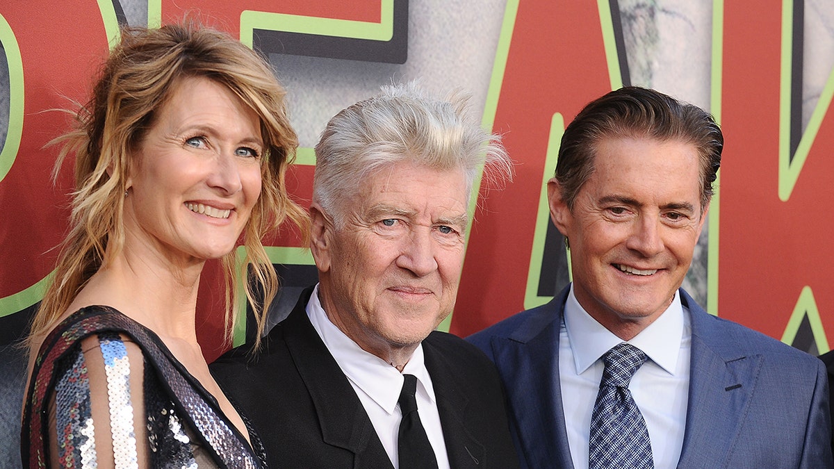 Laura Dern, David Lynch, and Kyle McLachlan posing together