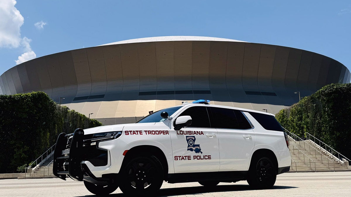 Louisiana State Police cruiser parked in front of the SuperDome in New Orleans, Louisiana
