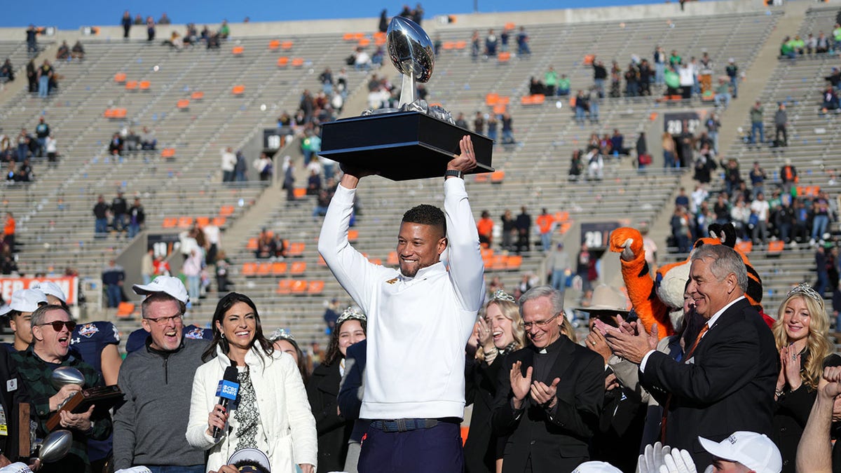 Marcus Freeman hoists trophy