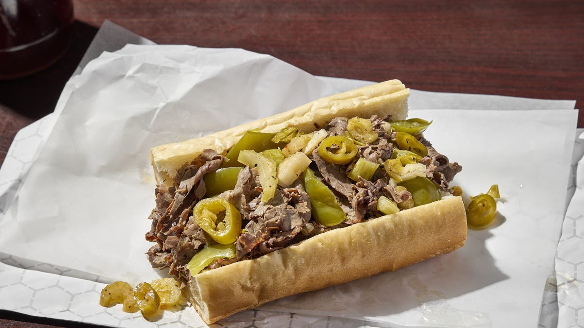 An Italian beef sandwich from Chicago's Mr. Beef is waiting to be eaten.