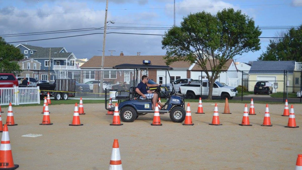 A police golf cart in an enclosed area