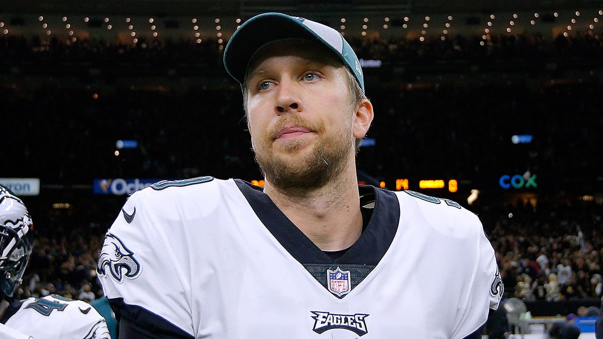 Nick Foles looks on field