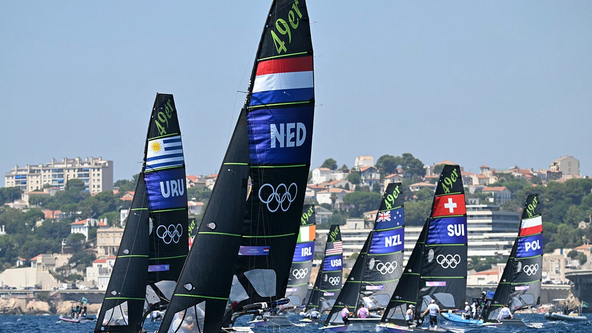 Olympic sailboats in water