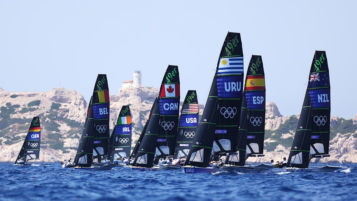 Olympic sailboats in water